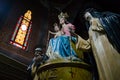 Statue of Virgin Mary enthroned with baby Jesus in her arms, crown on their heads and rosary in hands Royalty Free Stock Photo