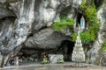 Statue of Virgin Mary in the grotto of Our Lady of Lourdes France Royalty Free Stock Photo