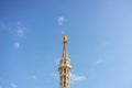 Statue of the Virgin Mary on top of Duomo Cathedral, Milan Cathedral. Madonna Golden Statue Perfect Bronze Replica in Royalty Free Stock Photo