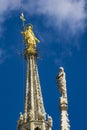 Statue of the Virgin Mary on top of Milan Cathedral Duomo di Milano in Italy Royalty Free Stock Photo