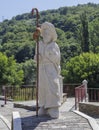 The statue of walking Pilgrim, in Samos, a town along the Camino de Santiago, Galicia, Spain.