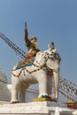 Statue of a warrior with a sword on top of a white elephant, Bodhnath stupa, Kathmandu, Nepal Royalty Free Stock Photo