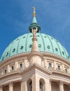 Statue of winged angel at dome of Evangelical church Saint Nikolai at blue sky, Potsdam, Germany, details, closeup