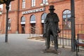 A statue of Wokulski standing on the platform of the station in Skierniewice