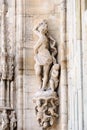 Statue of woman and cherubs,Milan Cathedral, Italy