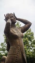 Statue of a woman at the fountain