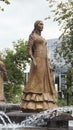 Statue of a woman at the fountain