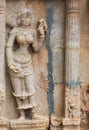 Statue of woman with lizard at Shirangam Temple.