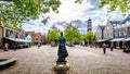 Statue of a woman in traditional dress in Bunschoten-Spakenburg in the Netherlands Royalty Free Stock Photo