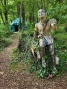 Statue in the woods, weathered, creepy, eery