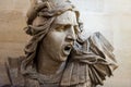 Statue of yelling man inside of the Arc de Triomphe at the Champs-Elysees Avenue in Paris, France Royalty Free Stock Photo