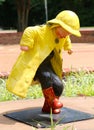 Statue of Young Child Splashing And Stomping In The Rain