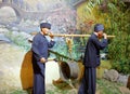 Statue of Zhuang farmers playing drum in Anthropology Museum Of Guangxi, adobe rgb