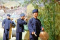 Statue of Zhuang farmers beating the gong and drum in Anthropology Museum Of Guangxi, adobe rgb