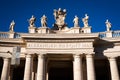 Statues above the columns of the arches around St. Peter's Square at the entrance to the Vatican in Rome Royalty Free Stock Photo