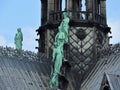 Statues of the apostles on the roof of Notre Dame, the approach of fragments. Paris France, UNESCO world heritage site Royalty Free Stock Photo