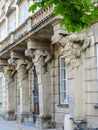 Statues of the Atlases holding a portico