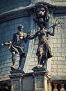 Statues on the baroque wing dome of Vajdahunyad Castle