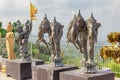 Statues of Buddha, elephants and mythical creature with wings in the temple in Phuket. Thailand Royalty Free Stock Photo