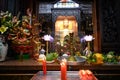 Altar with Buddha and Shiva Statues in Buddhist and Taoist Temple Jade Emperor Pagoda, Ho Chi Minh City, Vietnam. Royalty Free Stock Photo