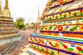 Statues and buildings around the reclining Buddha at the Wat Pho Temple Complex in Bangkok Royalty Free Stock Photo