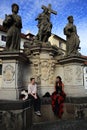 Statues on the Charles Bridge, historic buildings, Prague, Czech Republic Royalty Free Stock Photo