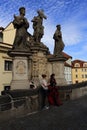 Statues on the Charles Bridge, historic buildings, Prague, Czech Republic Royalty Free Stock Photo