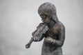 Statues of children playing musical instruments Royalty Free Stock Photo