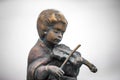 Statues of children playing musical instruments Royalty Free Stock Photo