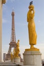 Statues and Eiffel Tower