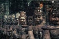 Statues in the entrance to the ancient city of Bayon in the Angkor Wat temple complex near Siem Reap, Cambodia Royalty Free Stock Photo