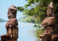 Statues in the entrance to the ancient city of Bayon in the Angkor Wat temple complex near Siem Reap, Cambodia. Royalty Free Stock Photo