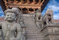 Statues at famous Nyatapola Temple at Durbar square in Bhaktapur, Kathmandu valley, Nepal Royalty Free Stock Photo