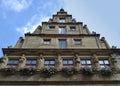 Statues and Flowers and a Fascinating Roof Royalty Free Stock Photo