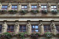 Statues and Flowers on a German Building