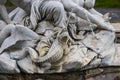 Statues of the fountain on the square of Empress Maria Theresa