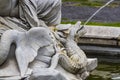 Statues of the fountain on the square of Empress Maria Theresa