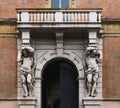 Statues in front of a house entry in Bologna, Italy Royalty Free Stock Photo