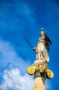 Statues the goddess Athena at the entrance of the Academy of Athens