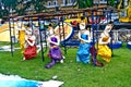 Statues of Godnesses as decoration at the parade for the King's birthday in Bangkok