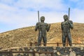 2 statues in high region of Fuerteventura island Royalty Free Stock Photo