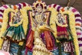 Statues of the Indian gods. Brahma, Vishnu Durga Shiva Ganesha, made with flowers for the the Masi Magam festival. Royalty Free Stock Photo