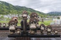 Statues of Japanese raccoon dog or tanuki at Torokko Kameoka Station Royalty Free Stock Photo