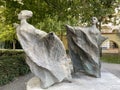 Statues of ladies in mantles in Franciscan Garden in Prague