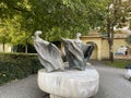 Statues of ladies in mantles in Franciscan Garden in Prague