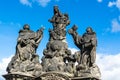 Statues of Madonna, Saint Dominic and Thomas Aquinas on Charles