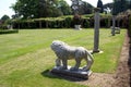 Statues of medici lions and columns at the Italian garden of Hever castle in England Royalty Free Stock Photo