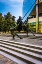 Statues and a modern building in downtown Richmond, Virginia.