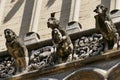 Statues of monstrous creatures on the facade of the Notre-Dame church in Dijon