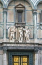 statues over doors of Baptistery in Florence